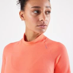 TEE SHIRT MANCHES LONGUES RUNNING SANS COUTURES FEMME - KIPRUN SKINCARE CORAIL -Activités De Plein Air tee shirt manches longues running sans coutures femme kiprun skincare corail 4